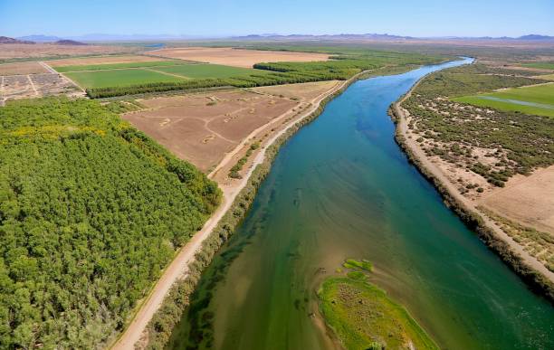 Lower Colorado River Aerial near Blythe, AZ Colorado River at California/Arizona Border near Blythe, AZ colorado river stock pictures, royalty-free photos & images