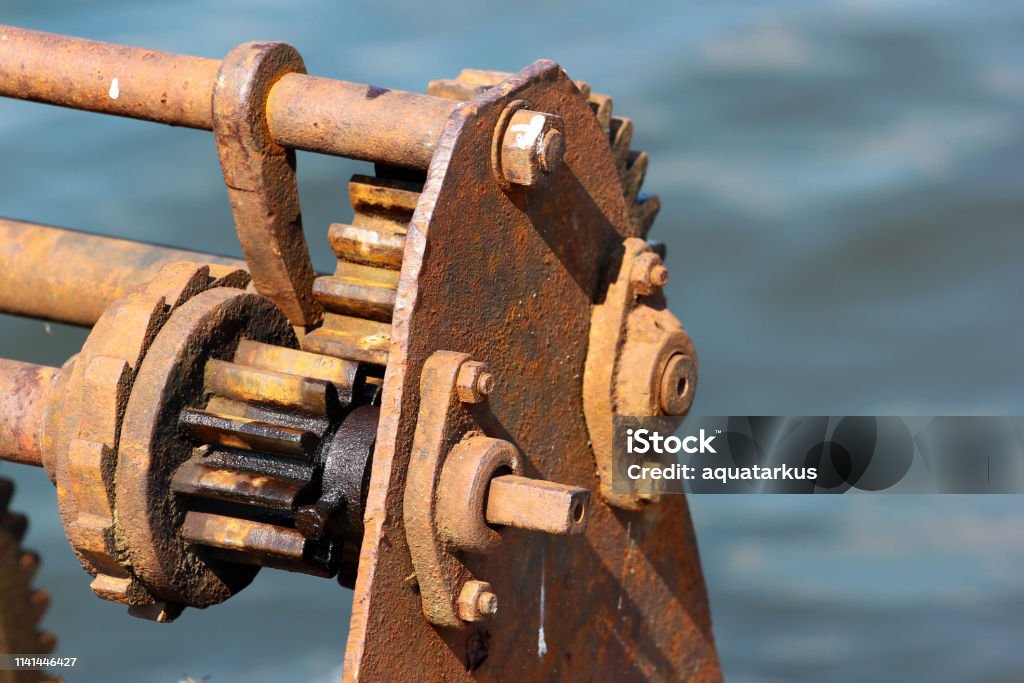 Ratchet And Pawl Mechanism Of Old Rusty Winch On A Pier Stock Photo - Download Image Now - iStock Ratchet And Pawl Mechanism Of Old Rusty Winch On A Pier Stock Photo - Download Image Now - iStock