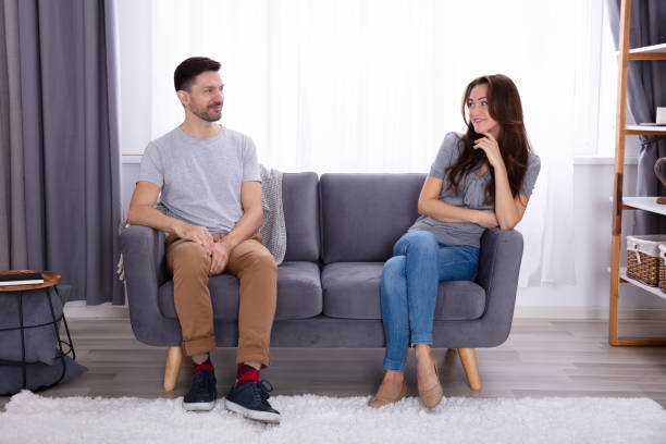 istock Smiling Couple Looking At Each Other 1141447231