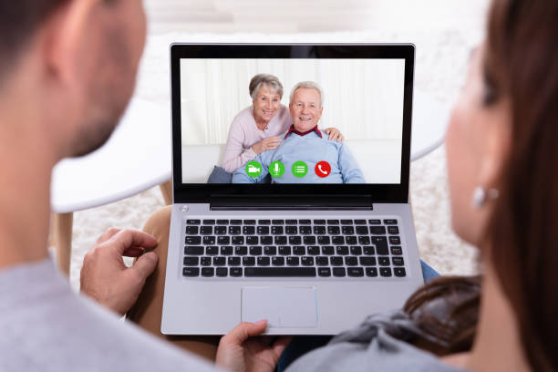 istock Couple Video Conferencing With Their Parents On Laptop 1141447256
