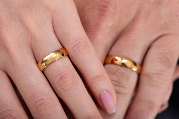 istock Couple's Hand Showing There Wedding Rings 1141447277