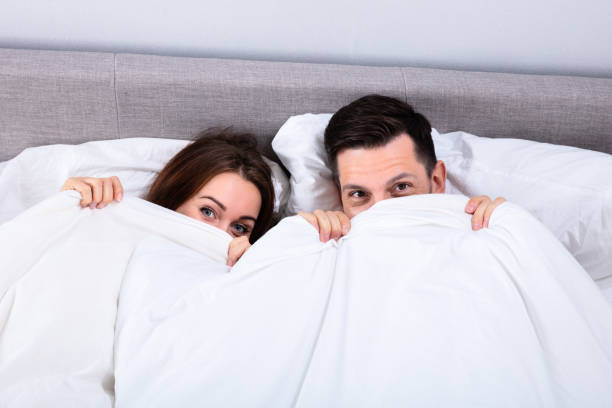 Free Stock Photo of Man and Woman Hiding Under a Blanket | Download ...