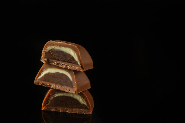 istock chocolate, sweets with filling - cut. top food background. copy space 1141450764