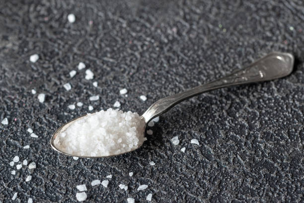 istock Spoon of sea salt 1141450775