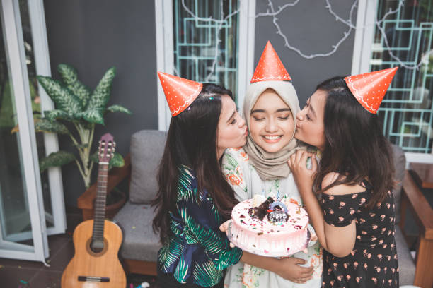 istock birthday celebration with best friends 1141453674