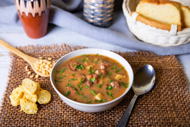 istock Pea soup with meat, smoked sausages and crackers. 1141455213