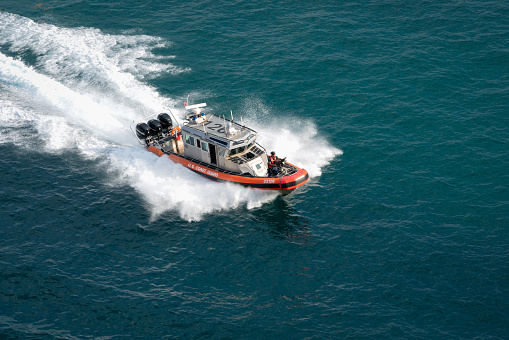 Port Everglades, Ft Lauderdale - March 17, 2019: United States Coast Guard boat patrols Port Everglades, Florida