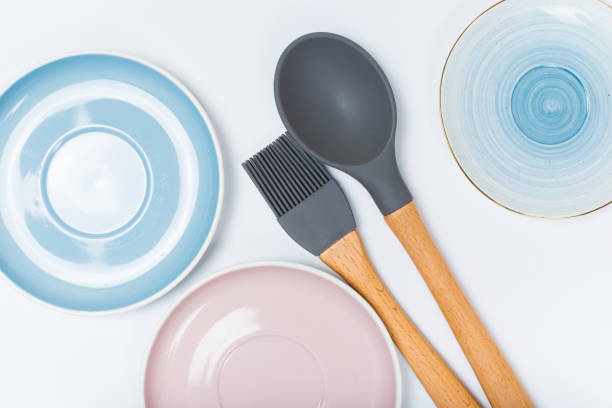 istock kitchen utensils, Clean  porcelain dishes on white  background 1141458711