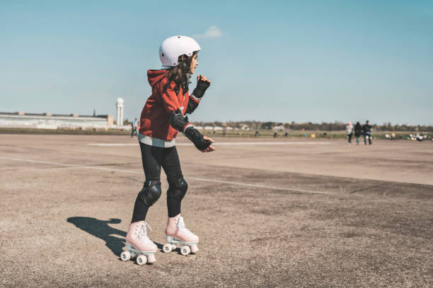 istock little girl on roller skates on Tempelhofer Feld in Berlin 1141459996