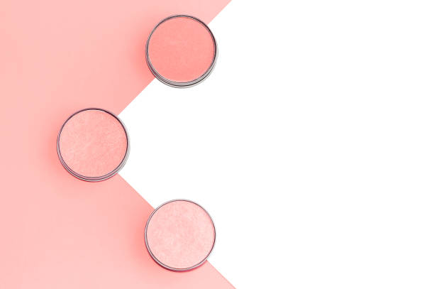 istock Cosmetics flat lay on coral and isolated white background. 1141462006