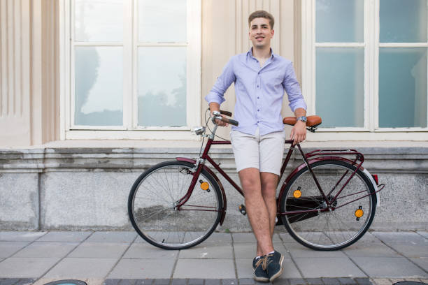 istock Guy with a bike taking a break 1141462106