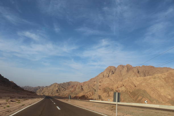 istock Road to the great mountain 1141464656