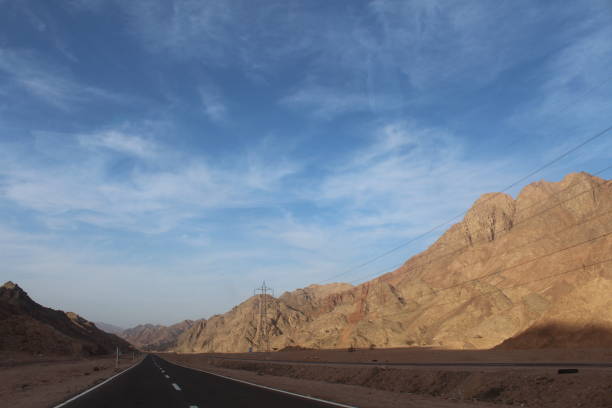 istock Road to the great mountain 1141464710