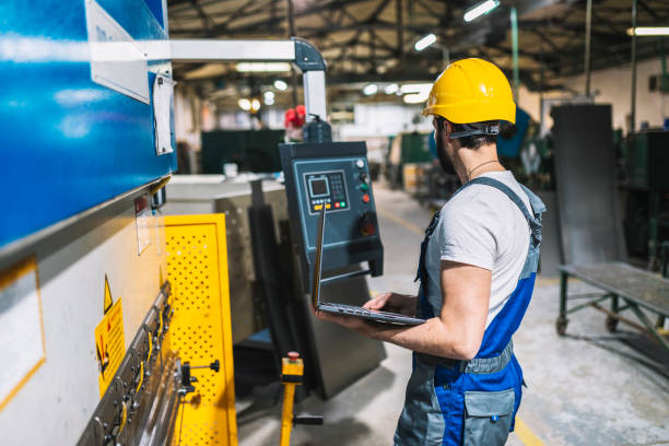 istock Man working at a factory 1141465598