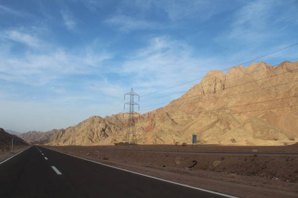 istock Sky and beautiful mountain landscape with road 1141465649
