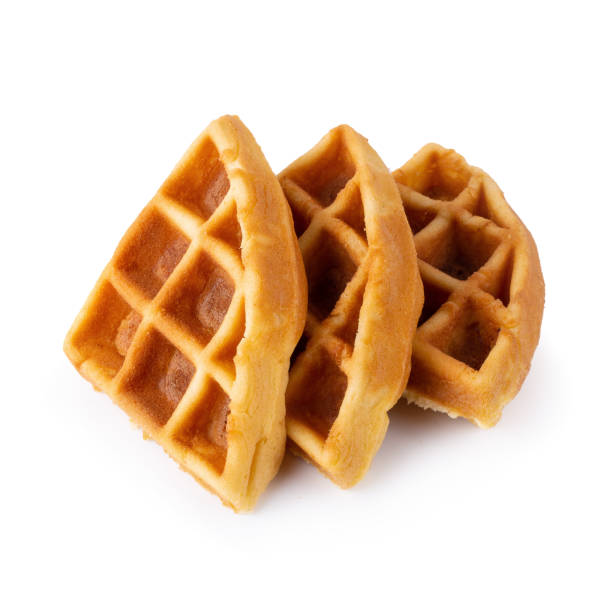 istock Freshly baked waffles isolated over white background. 1141467948