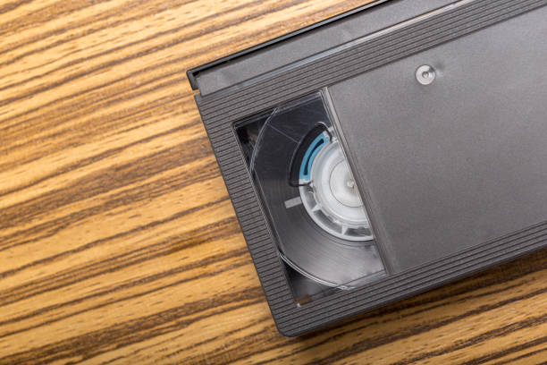 istock video tape cassette over wooden background 1141468618