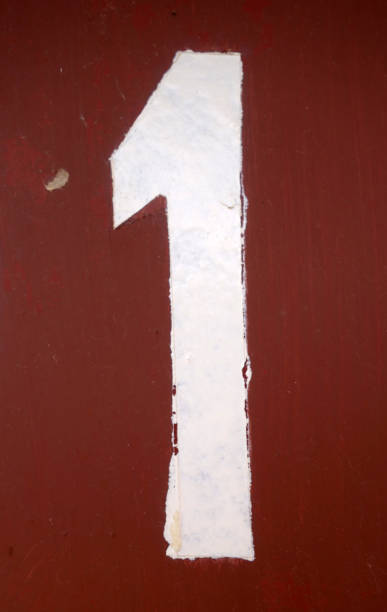 istock Number 1 in stencil on metal wall. 1141468635