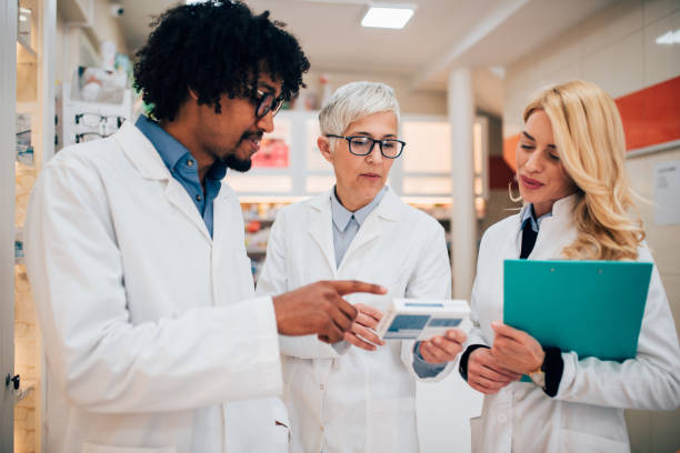 istock Pharmacists holding medicine 1141469976