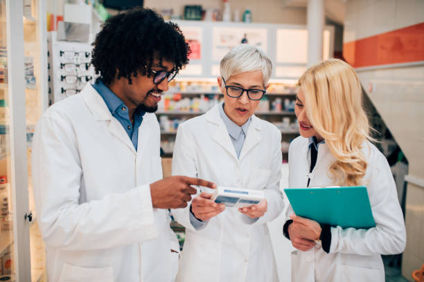 istock Pharmacists looking at medicine 1141470682