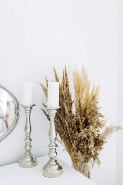 istock Bright modern interior with dried flowers. Minimalism in the interior decor. 1141474335