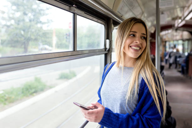 istock Young woman in public transportation 1141479929