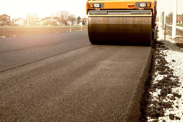 istock Road machine flattening asphalt. Road construction. 1141480170