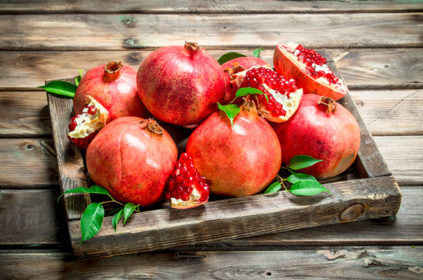 istock Juicy pomegranates on the tray. 1141481241