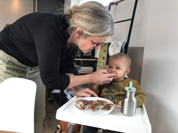 istock Cute eating baby boy 1141487210