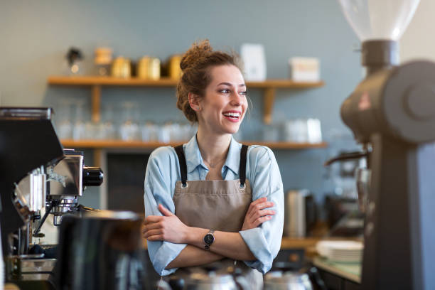 istock Woman working in coffee shop 1141489298