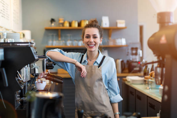 istock Woman working in coffee shop 1141489372