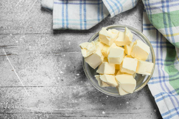 istock Butter in a glass bowl with napkin . 1141489803