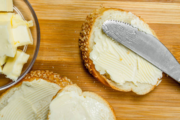 istock Fresh bread and butter on the Board . 1141489946