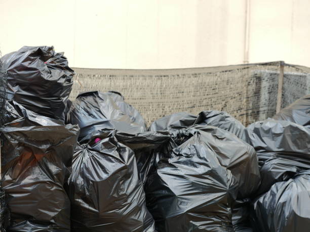 Garbage Bag Garbage, Bag, Sack, Plastic Bag, Tied Knot overflowing trash dumpster stock pictures, royalty-free photos & images