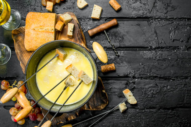 istock Delicious fondue cheese with white wine. 1141492106