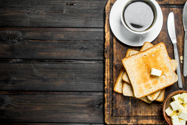 istock Toasted bread with butter and coffee. 1141493677