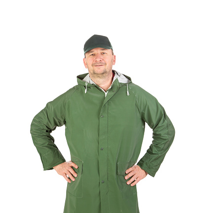 Worker holding winter vest. Isolated in a white background. Close-up.