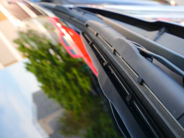 istock Windshield wipers of a white car 1141501017