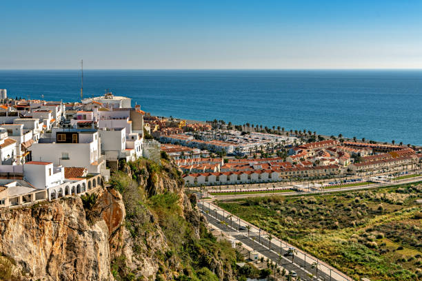 View of vacation homes in Salobreña, Spain, by the Mediterranean sea. stock photo
