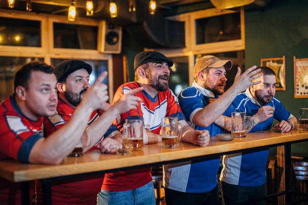 istock Soccer fans in pub 1141504343