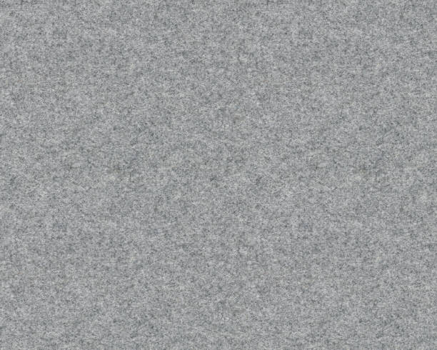 istock Grey classic needled carpet texture background. Rug with shallow pile for drape. 1141504706