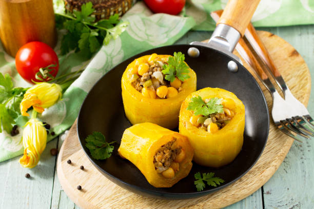 istock Healthy food: Baked Zucchini Stuffed - with chickpea and Meat on kitchen table. Diet menu. 1141504888
