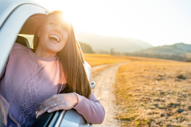 istock Young driver portrait looking at the car window 1141505567