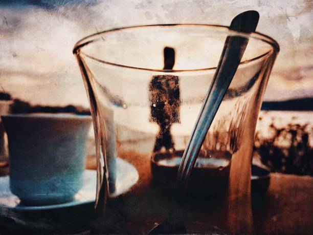 Defocused silhouette of man in the empty glass