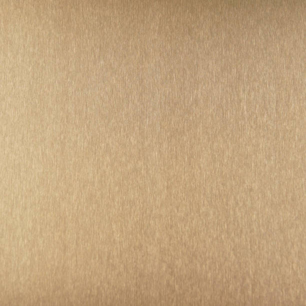 istock Metal surface brass texture background. Shiny bronze background. 1141507225