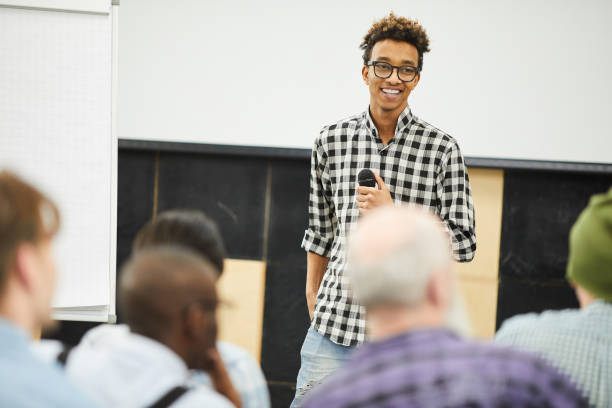 istock Positive successful young entrepreneur at business conference 1141509195