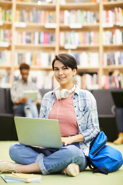istock Student girl using online resource on laptop 1141509250