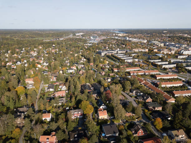 istock Flying over villa area, early fall day 1141511131