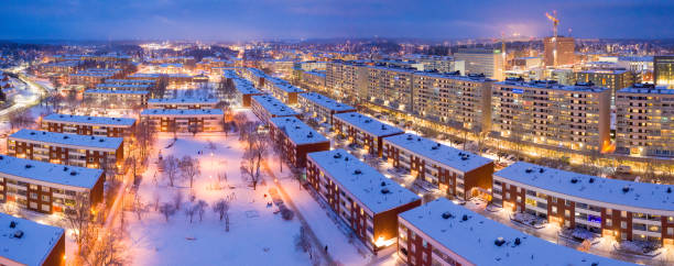 istock Flying over suburbs Malmvagen, winter night 1141511200