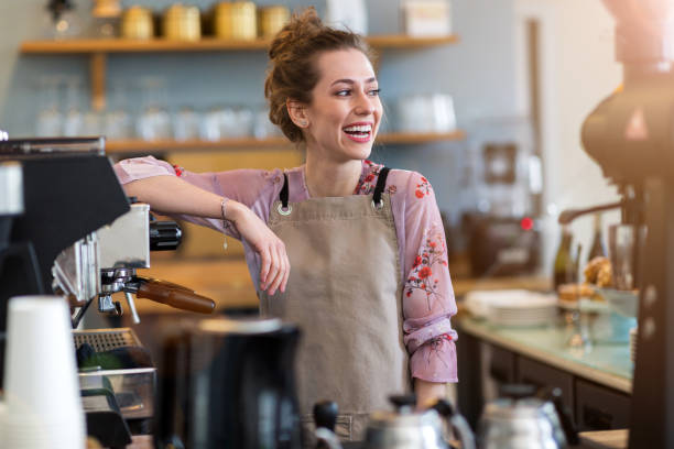 istock Woman working in coffee shop 1141511685